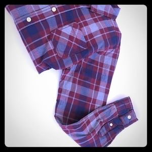 Long sleeved button up shirt with flannel pattern